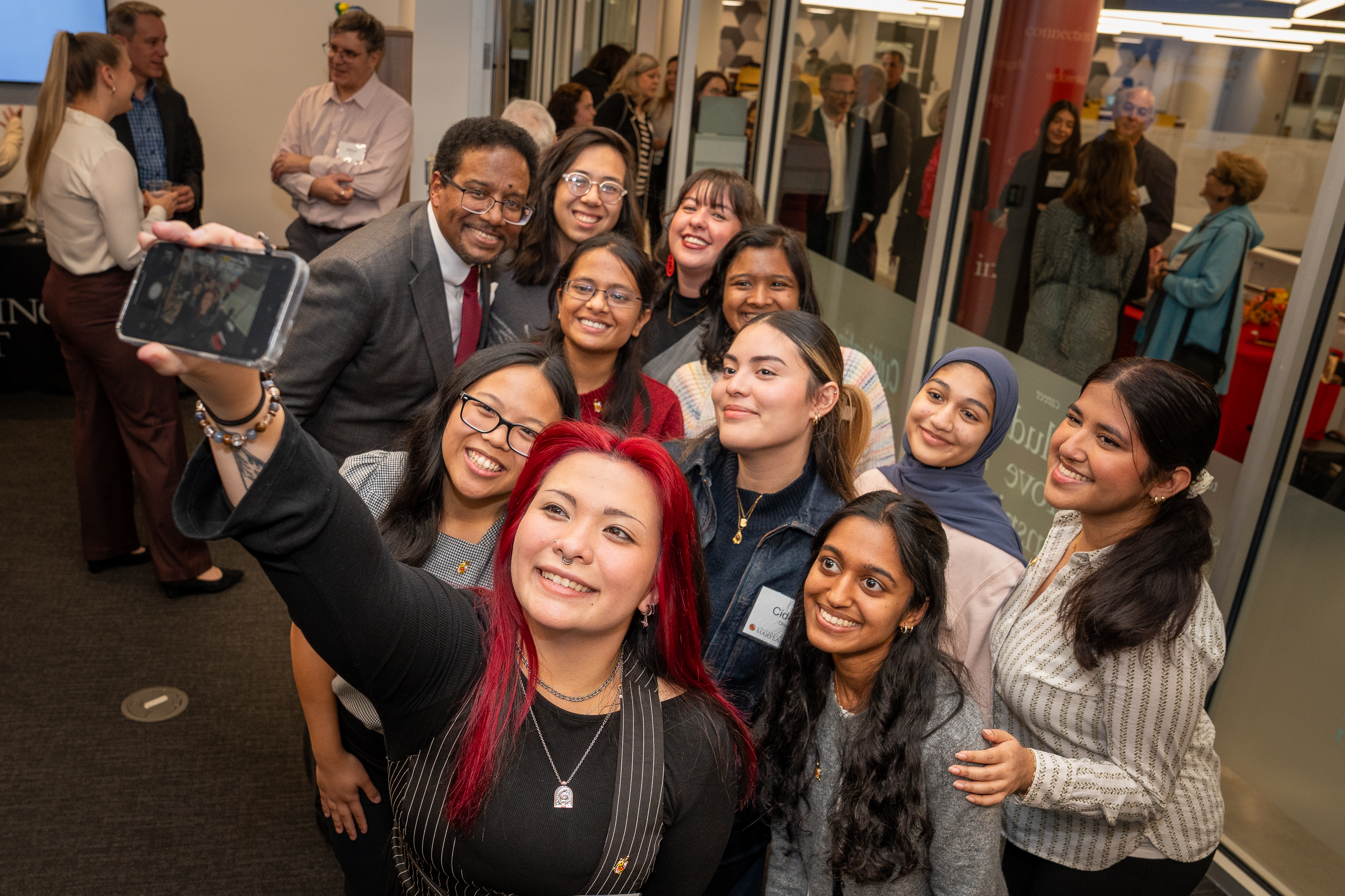 Computing Catalyst staff and students post with UMD President Darryll J. Pines