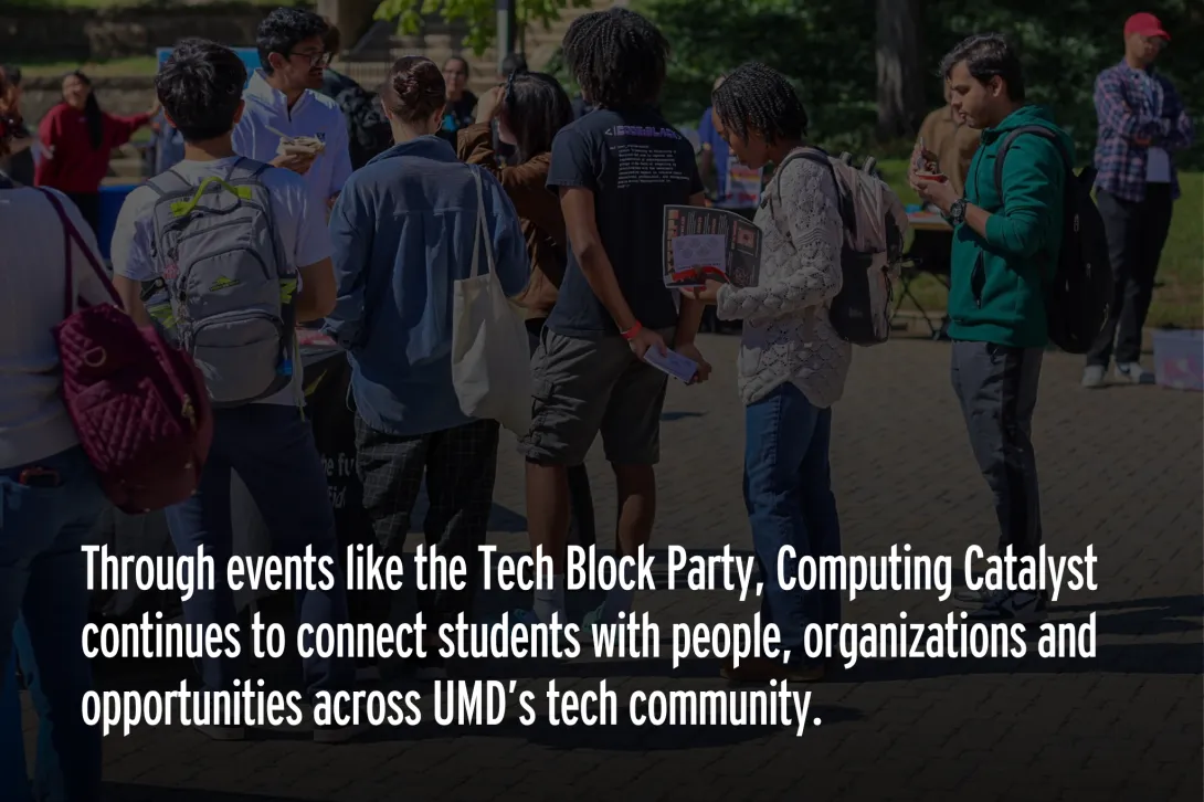 1. Students gather around organization tables at Hornbake Plaza.