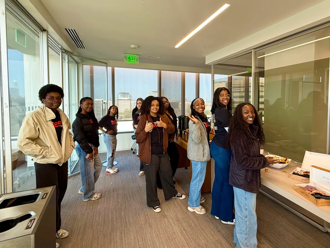 RESET Scholars stand in line to get food during EY field trip